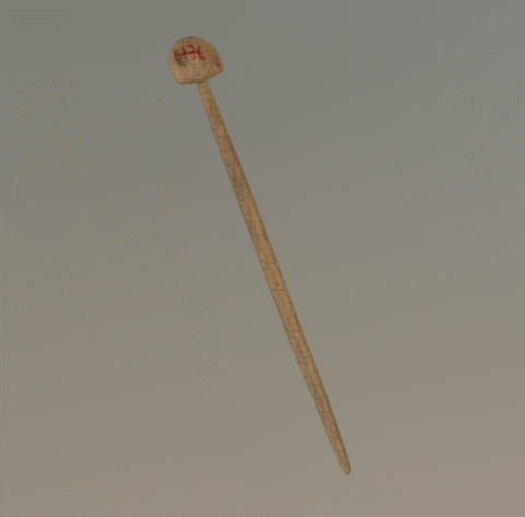 Puinen päistään kapeneva varsi sekä siihen liittyvä puoliympyränmuotoinen litteä nuppiosa.